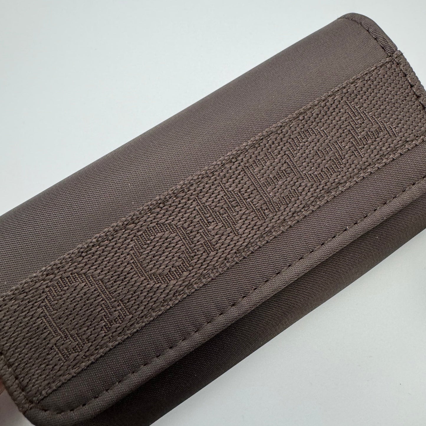 Omega Brown Canvas Clutch Purse